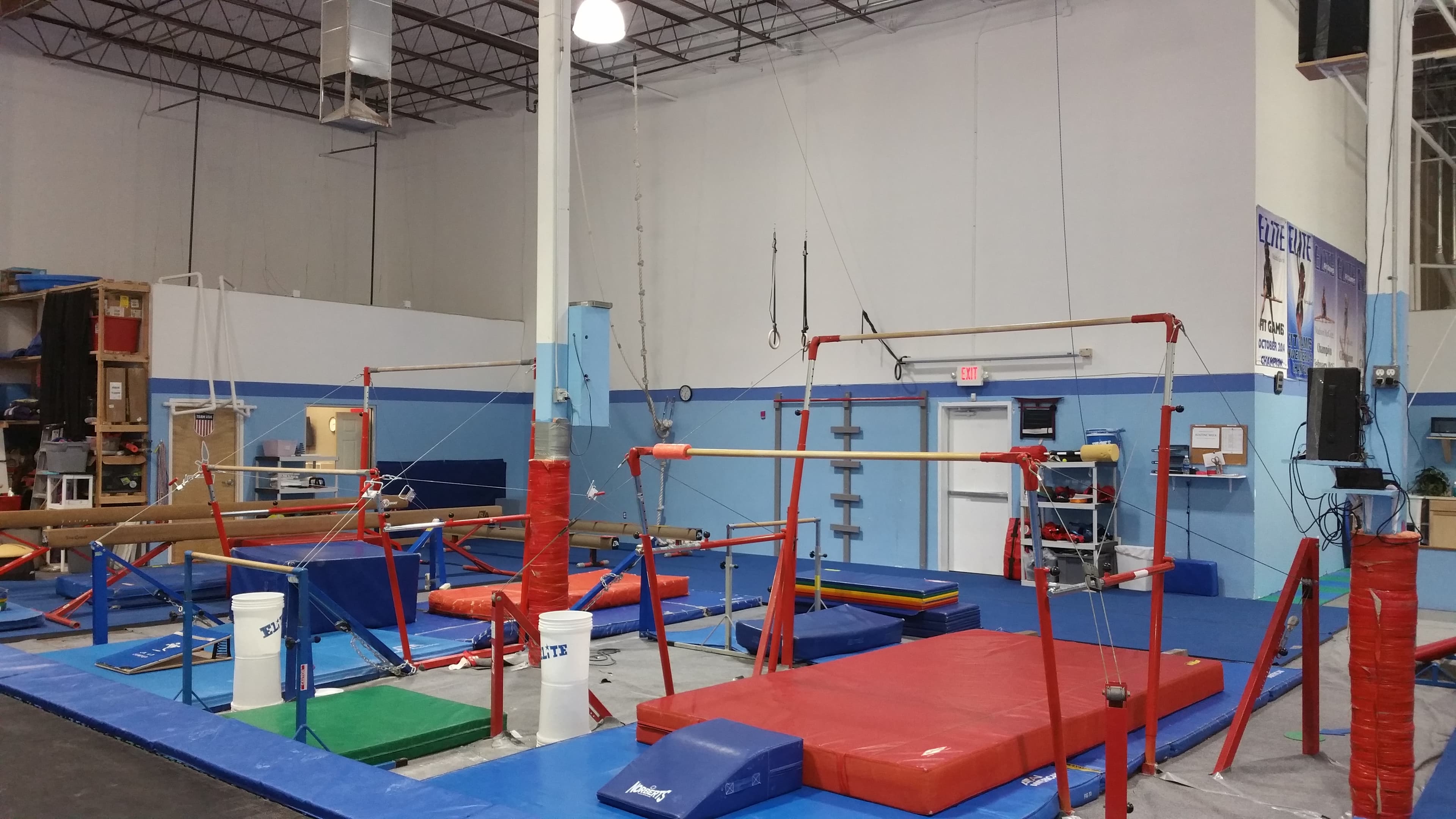 El Paso Gymnastics training equipment — bars, beam, and rings